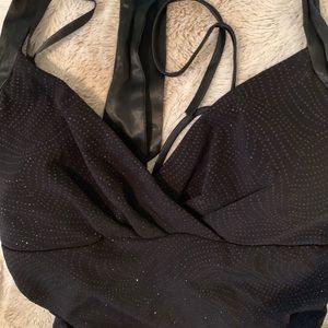 Black shimmer, backless gown.